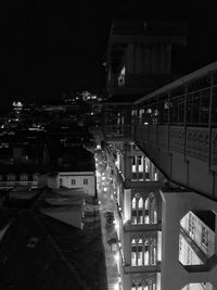 High angle view of city buildings at night