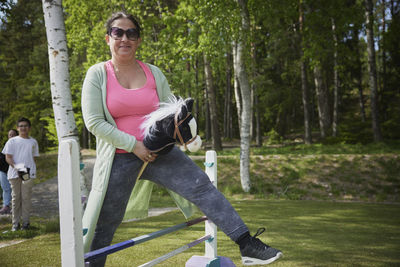 Woman participating in hobby horse competition