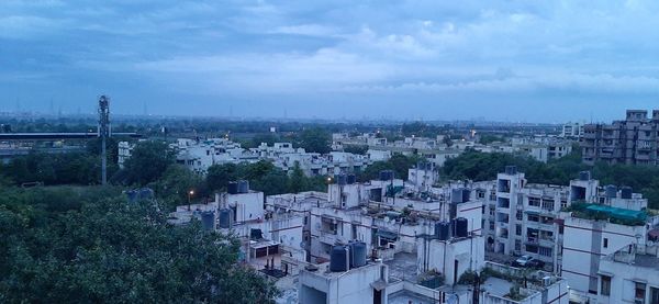 High angle shot of townscape against sky