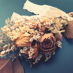 Close-up of dried plant on table