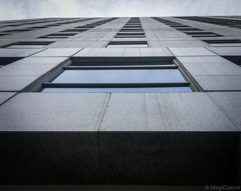 Low angle view of modern building against sky