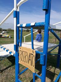 Man against blue sky