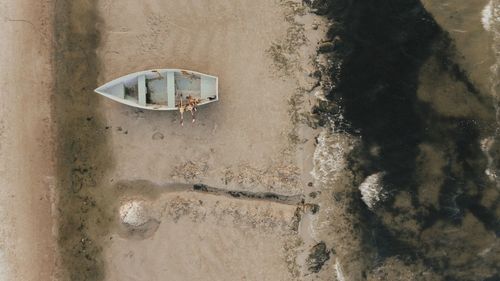 Boat on sand at beach