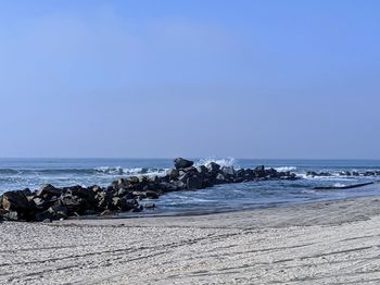 Scenic view of sea against clear sky