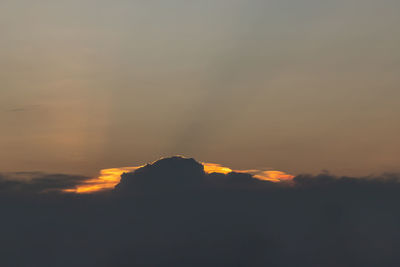 Scenic view of silhouette mountain against sky during sunset