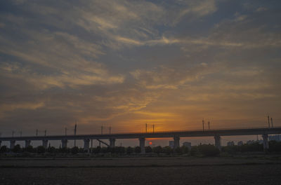 Scenic view of sea against orange sky