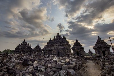 Historic building against cloudy sky
