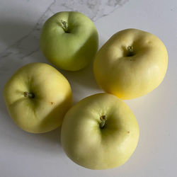 High angle view of apples on table