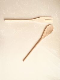 High angle view of wooden spoon on table