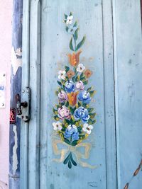 Close-up of closed metal door on wall