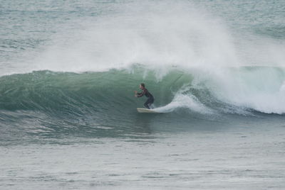 Man surfing in sea