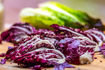 Close-up of purple cabbage on cutting board