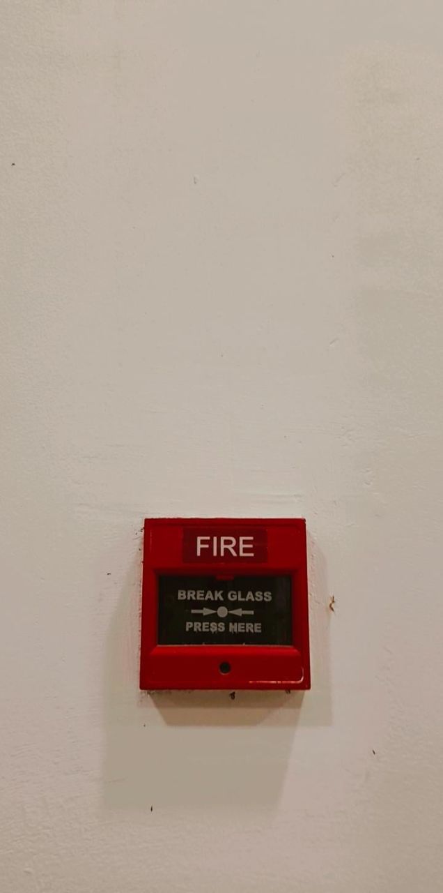 communication, text, wall - building feature, western script, red, sign, fire alarm, accidents and disasters, no people, warning sign, white, protection, security, copy space, architecture, indoors, built structure, close-up