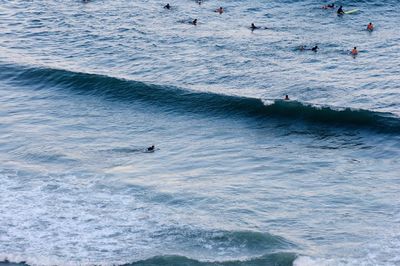 High angle view of people in sea