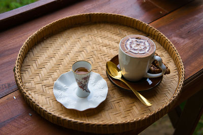 High angle view of coffee cup on table