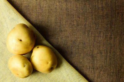 Close-up of potatoes on burlap