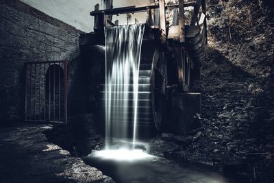 Water flowing in old building