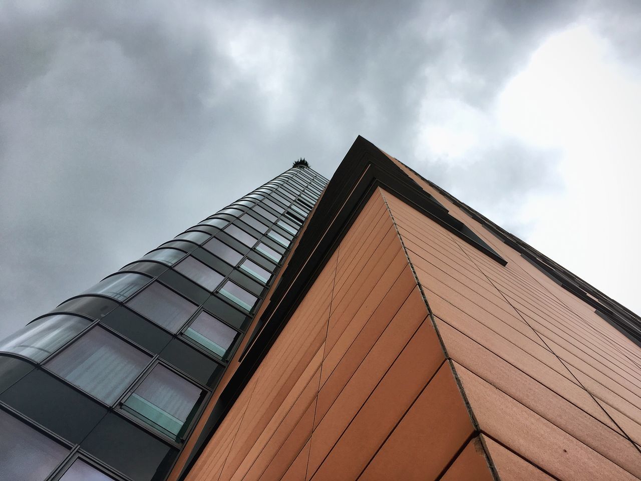 architecture, built structure, low angle view, building exterior, sky, modern, no people, day, outdoors, cloud - sky, city