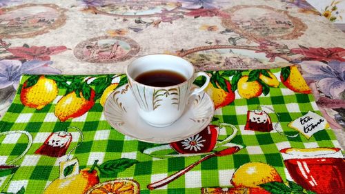 High angle view of coffee cup on table