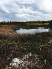 Scenic view of lake against sky