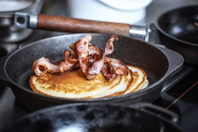 High angle view of meat in cooking pan