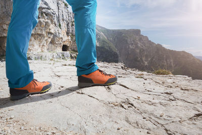 Low section of people standing on mountain