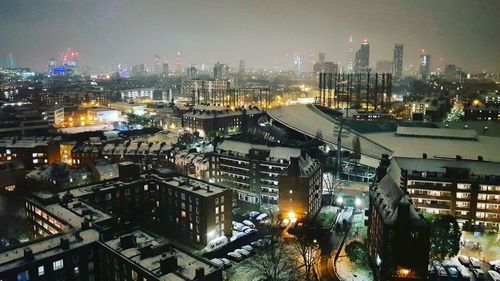 High angle view of illuminated cityscape during winter