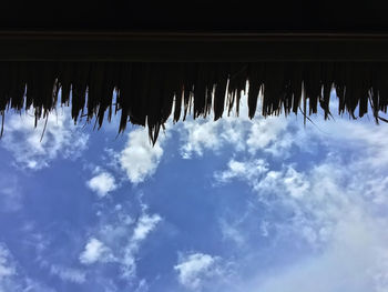 Low angle view of roof against sky