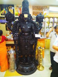 Close-up of buddha statue in temple