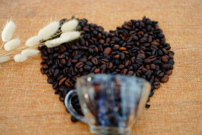 Close-up of coffee beans on table