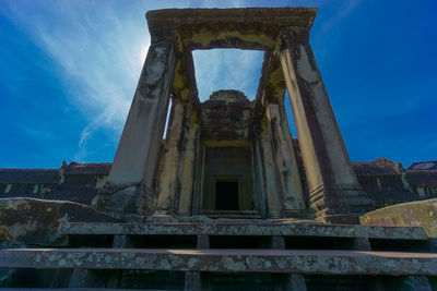 Low angle view of old building against sky