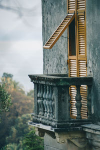 Close-up of built structure against sky