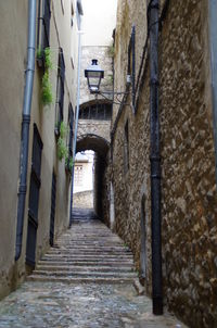 Narrow alley along buildings