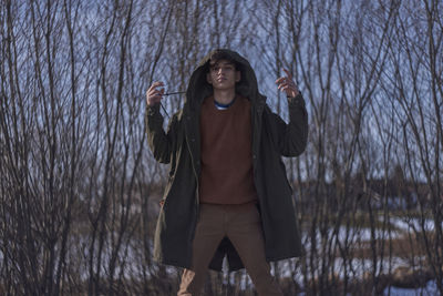 Man standing outdoors during winter