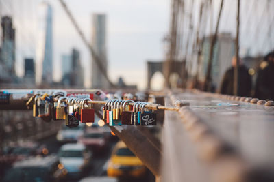 Close-up of padlocks on railing