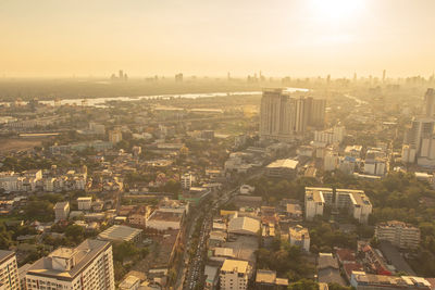 High angle view of buildings in city against sky