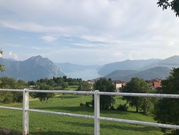 Scenic view of landscape and mountains against sky