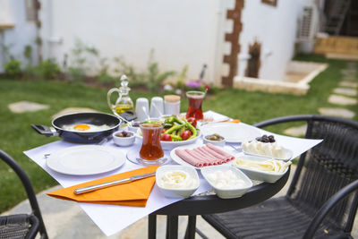 Table and chairs in yard