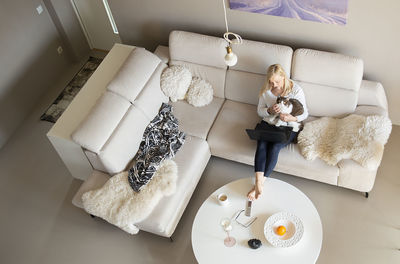 High angle view of stuffed toy on sofa at home