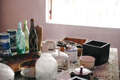 Close-up of bottles in container