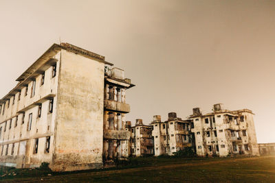 Low angle view of old building against sky