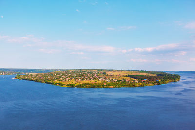 Dnister river and molovata noua village in moldova . rustic human settlement on the island