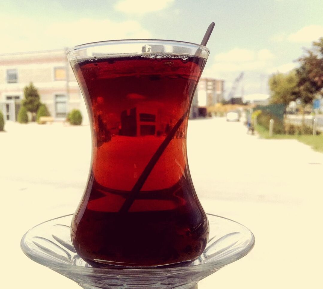 drink, food and drink, focus on foreground, refreshment, close-up, drinking glass, red, freshness, table, glass - material, alcohol, transparent, cold temperature, glass, still life, drinking straw, cocktail, sky, day, outdoors