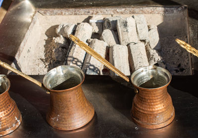 Close-up of objects on wooden floor