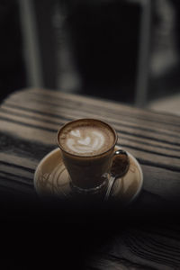 High angle view of coffee cup on table