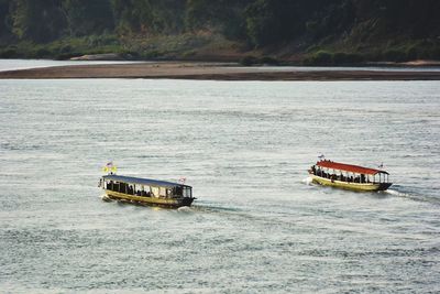 Boats sailing in sea