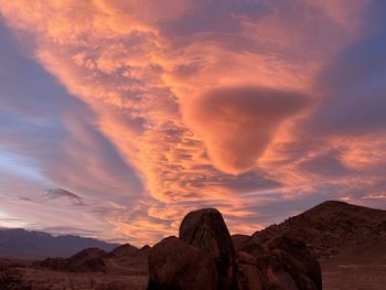 Scenic view of landscape against sky during sunset