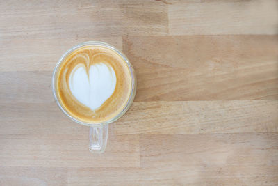 Directly above shot of coffee cup on table