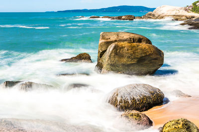 Scenic view of sea shore against sky