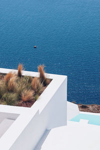 High angle view of swimming pool by sea